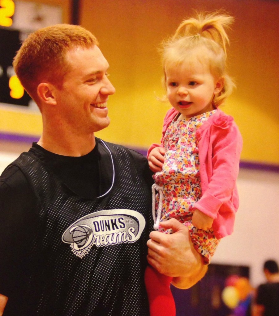 Travis Lulay with daughter